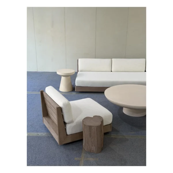 Floating Teak Outdoor Modular Sofa Set with Swivel Chairs in clay — in a room setting
