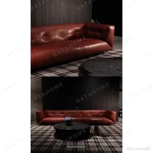 Quiet Luxury Sofa in Cognac Aniline Bull Leather — in a room setting