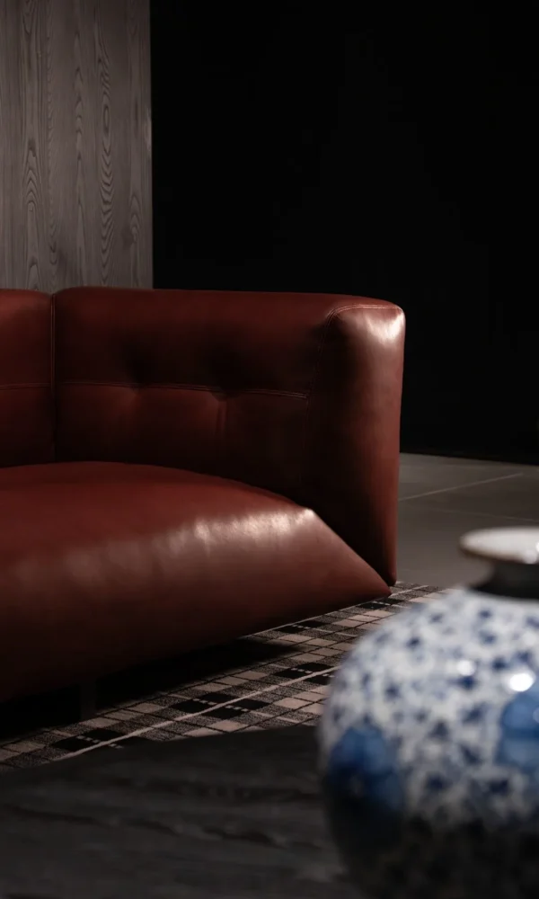 Quiet Luxury Sofa in Cognac Aniline Bull Leather — in a room setting