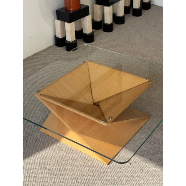 Twisted Wood Base Square Glass Coffee Table in natural oak — in a room setting