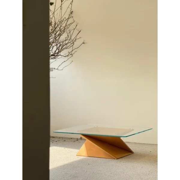 Twisted Wood Base Square Glass Coffee Table in natural oak — in a room setting