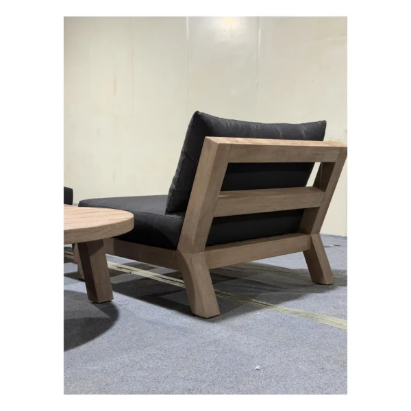 Solid Teak Outdoor Sofa Set with Navy Cushions in natural oak — in a room setting