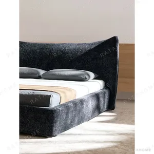 Mermaid Ultra-Thin Curved Headboard Bed in black — in a room setting
