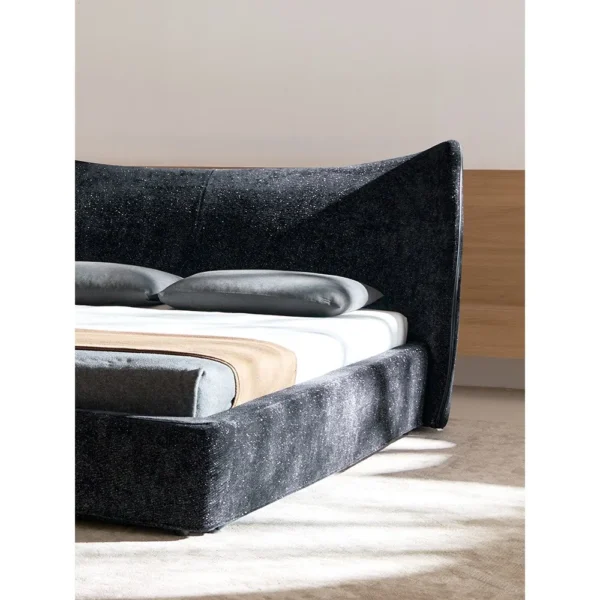 Mermaid Ultra-Thin Curved Headboard Bed in black — in a room setting