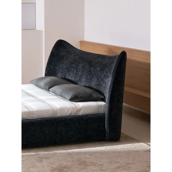 Mermaid Ultra-Thin Curved Headboard Bed in black — in a room setting