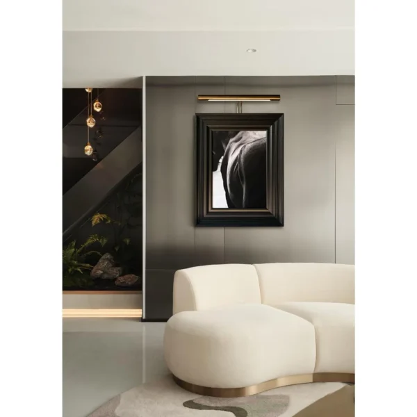 Metal Frame Monochrome Figure Wall Art with Picture Light in black — in a room setting