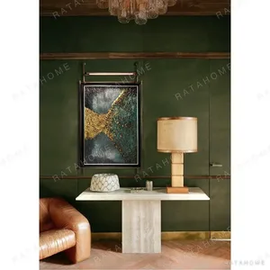 Metal Frame Teal and Gold Abstract Wall Art on Hanging Rail in blue — in a room setting