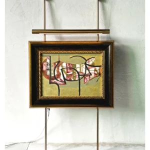 Metal Frame Small Abstract Wall Art on Brass Rails in red — in a room setting
