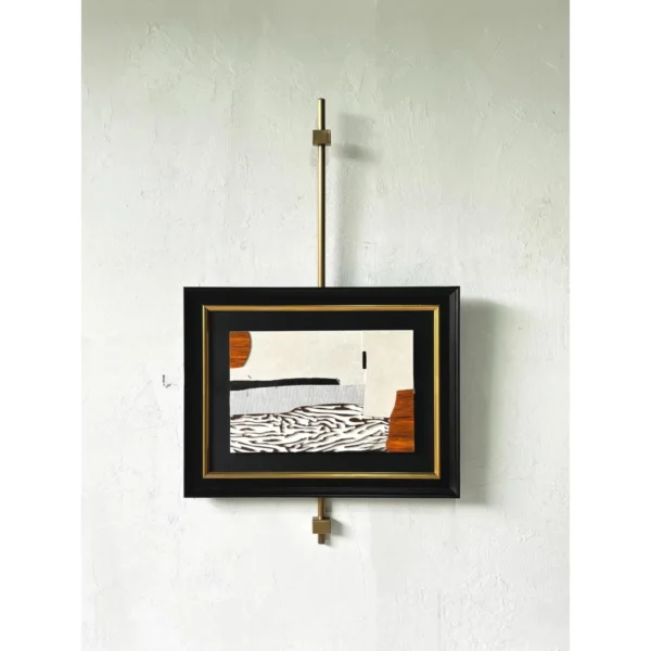 Metal Frame Small Wall Art on Brass Rod for Bedside in black — in a room setting