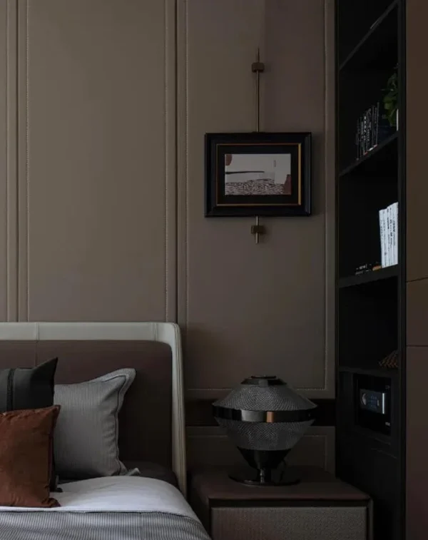 Metal Frame Small Wall Art on Brass Rod for Bedside in black — in a room setting