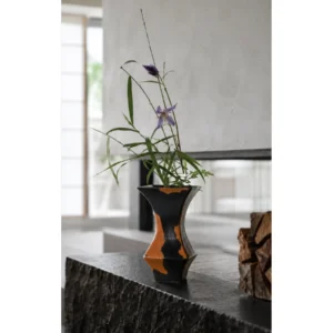 Mid-Century Black and Rust Kiln-Change Angular Vase in black — in a room setting