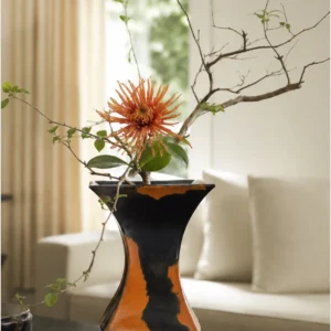 Mid-Century Black and Rust Kiln-Change Angular Vase in black — in a room setting
