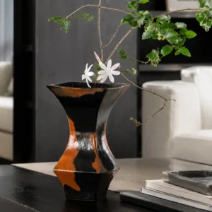 Mid-Century Black and Rust Kiln-Change Angular Vase in black — in a room setting