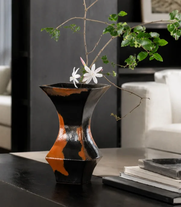 Mid-Century Black and Rust Kiln-Change Angular Vase in black — in a room setting