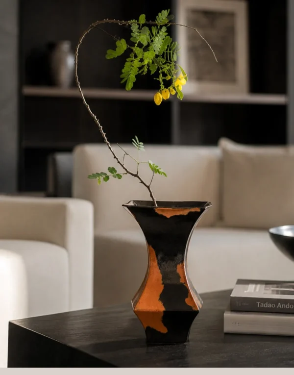 Mid-Century Black and Rust Kiln-Change Angular Vase in black — in a room setting