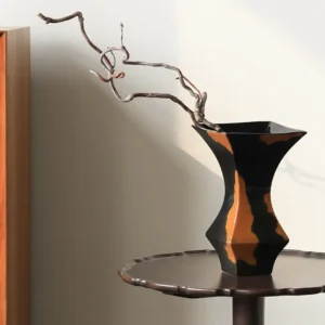 Mid-Century Black and Rust Kiln-Change Angular Vase in black — in a room setting