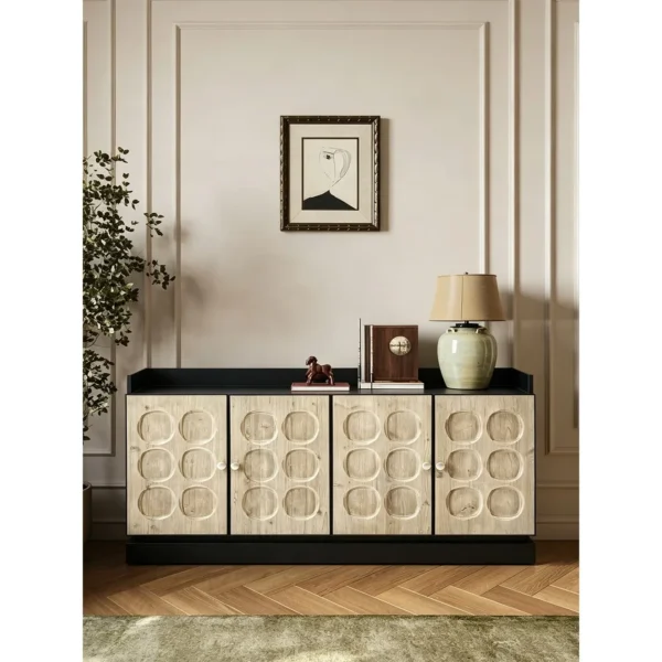 Carved Circle Relief Sideboard, Black and Cream in black — in a room setting