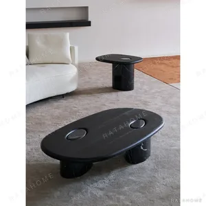 Black Ash Coffee Table Set in black — in a room setting