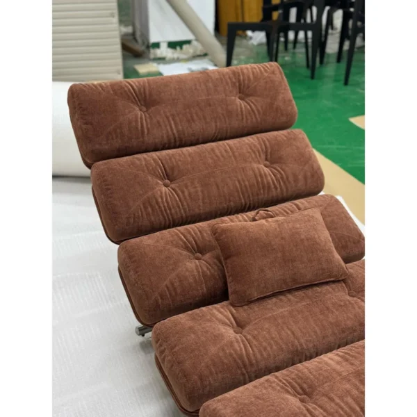 Mid-Century Ribbed Chaise Lounge in rust — in a room setting