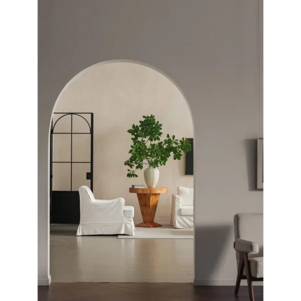 Mid-Century Four-Sided White Ceramic Vase in Matte Glaze — in a room setting