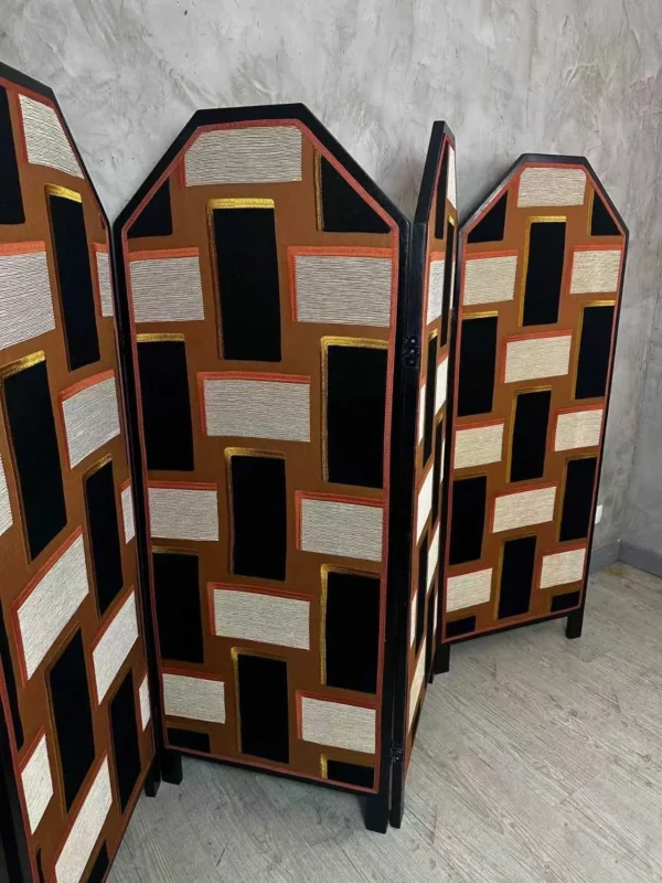 Mid-Century Geometric Fabric Collage Folding Screen in rust — in a room setting