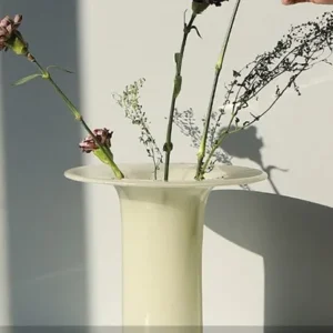 Mid-Century Yellow Jade Glass Vase in mustard — in a room setting