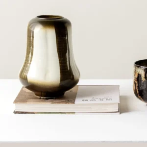 Mid-Century Gradient Glaze Ceramic Vessel in Cream and Olive — in a room setting