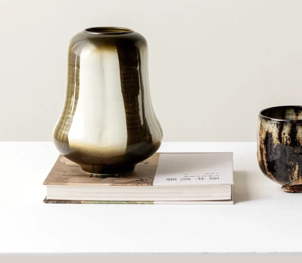 Mid-Century Gradient Glaze Ceramic Vessel in Cream and Olive — in a room setting