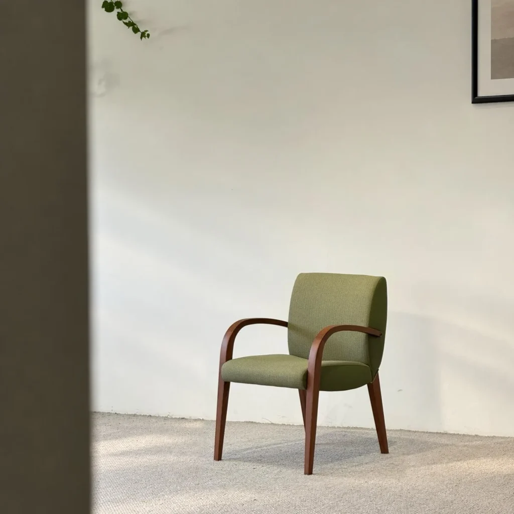 Mid Century Green Armchair in solid wood — front view