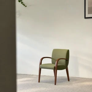 Mid Century Green Armchair in solid wood — front view