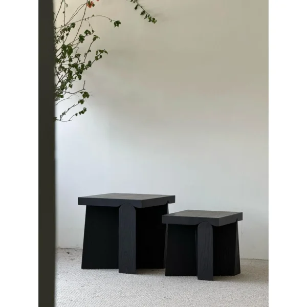 Mid-Century Black Wood Nesting Side Tables, 45 and 55 cm in black — in a room setting