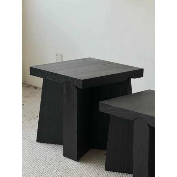 Mid-Century Black Wood Nesting Side Tables, 45 and 55 cm in black — in a room setting