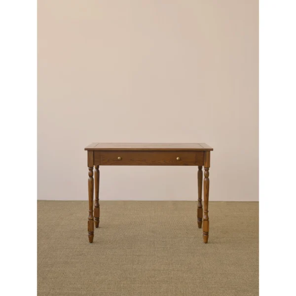Small Ash Writing Desk with Turned Legs and Drawer, 100 cm in clay — in a room setting