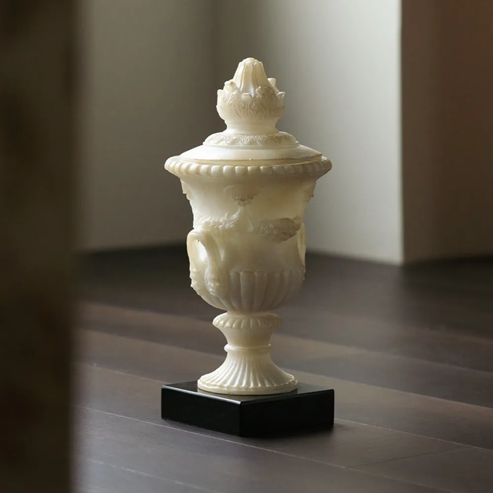 Jade-Effect Roman Lidded Urn Ornament on Black Base in oatmeal — front view
