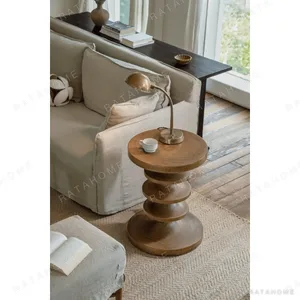 Mid-Century Stacked Disc Solid Wood Side Table in walnut — in a room setting