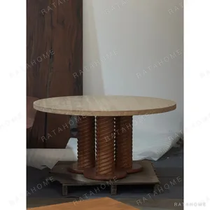 Mid-Century Travertine Round Table on Twisted Wood Columns in oatmeal — in a room setting