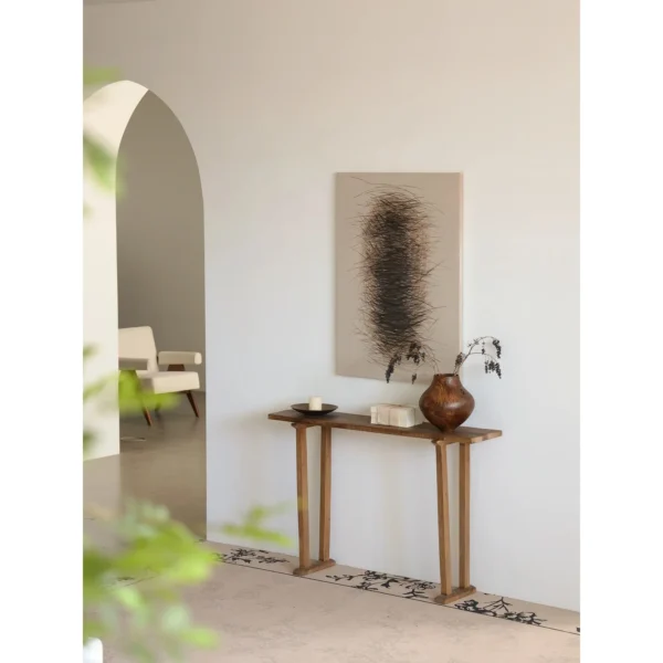 Wabi-Sabi Brass Console Table in brushed brass — in a room setting