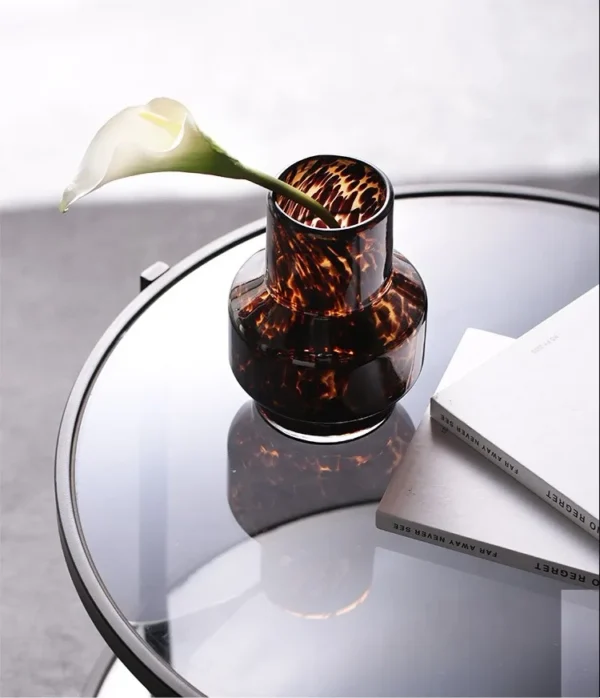 Tortoiseshell Glass Bud Vases, Large or Small in clay — in a room setting