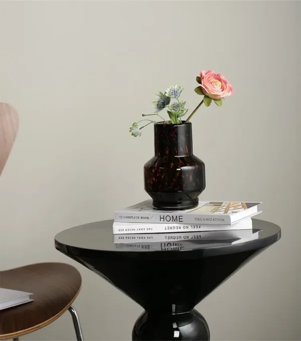 Tortoiseshell Glass Bud Vases, Large or Small in clay — in a room setting