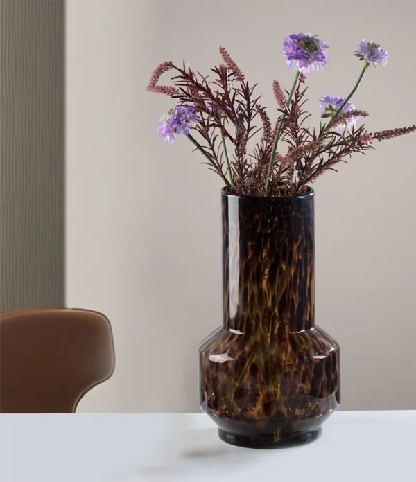 Tortoiseshell Glass Bud Vases, Large or Small in clay — in a room setting