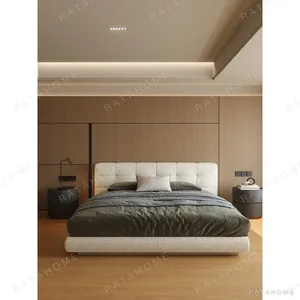 Wide Checkerboard-Stitched Linen Bed in oatmeal — in a room setting