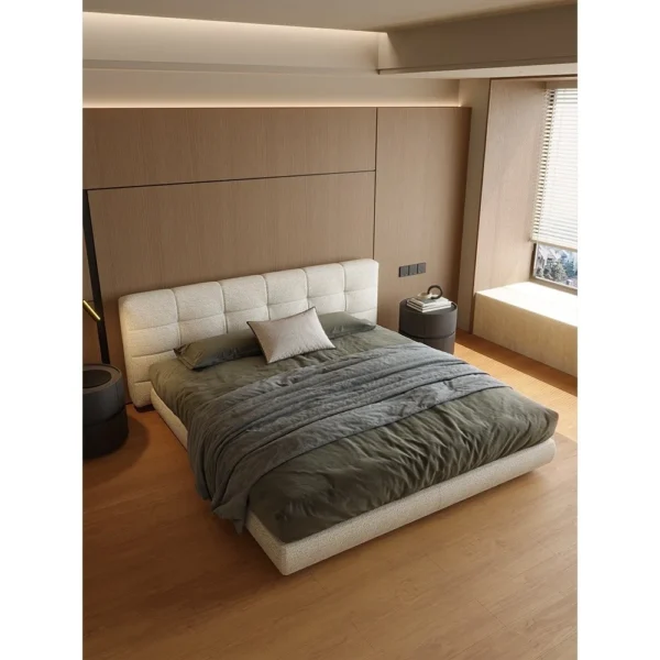 Wide Checkerboard-Stitched Linen Bed in oatmeal — in a room setting