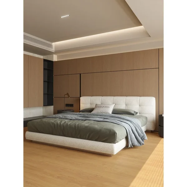 Wide Checkerboard-Stitched Linen Bed in oatmeal — in a room setting