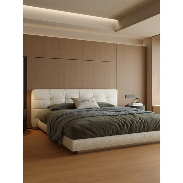 Wide Checkerboard-Stitched Linen Bed in oatmeal — in a room setting