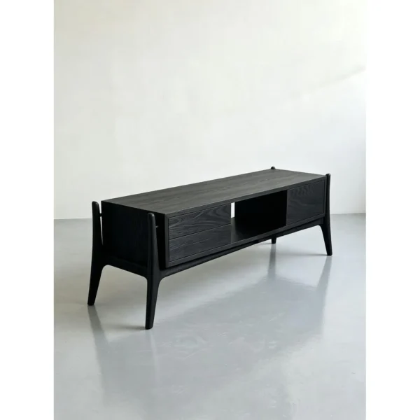 Minimalist Black Ash TV Stand with Angled Legs, 180 cm in black — in a room setting