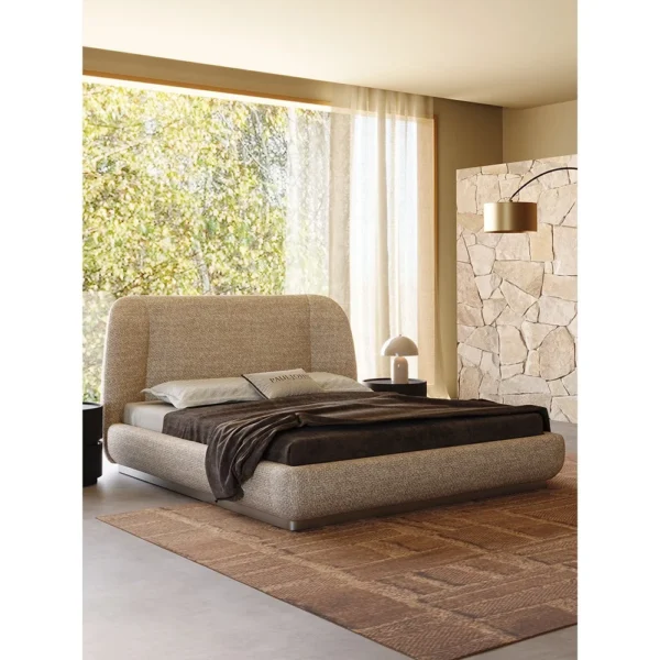 Curved Embrace Linen Bed on Floating Metal Base in sand — in a room setting