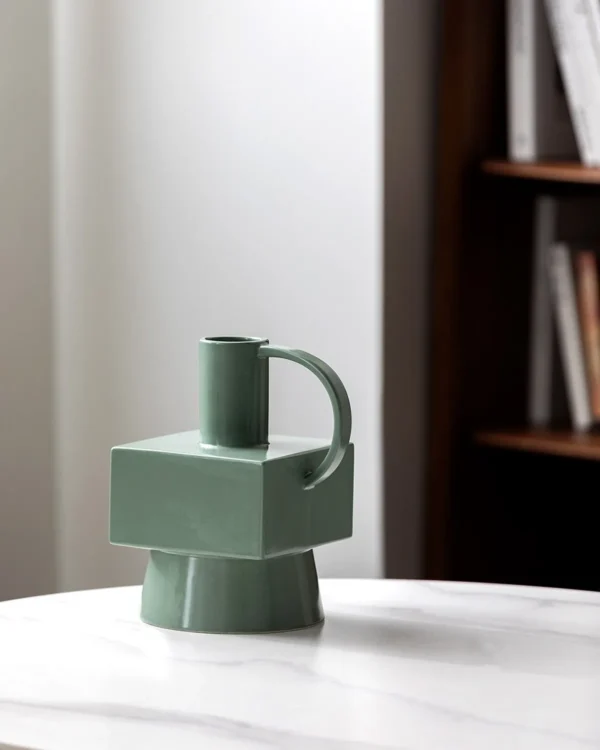 Geometric Dark Green Ceramic Vases with Square Handles in olive — in a room setting