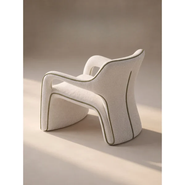 Jianxu White Bouclé Lounge Chair with Green Piping in ivory — in a room setting