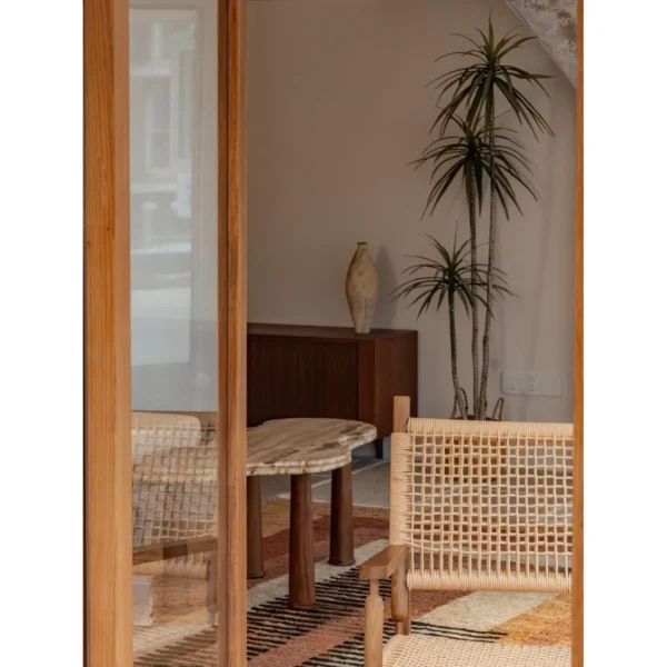 Misge Hand-Woven Rattan Cord Lounge Chair on Oak Frame in natural oak — in a room setting