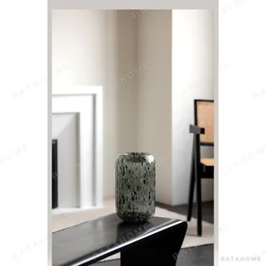 Hand-Made Mist Grey Speckled Tall Glass Vase in slate — in a room setting